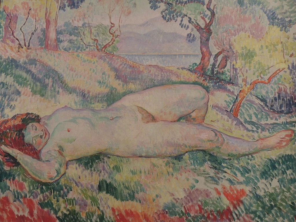 Nuda distesa in un paesaggio
